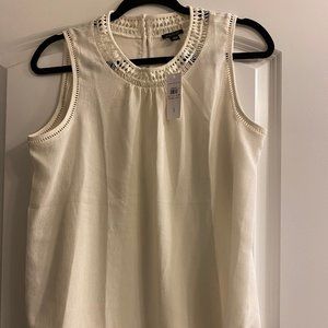New, never worn, Ann Taylor white top. Brand New, in non-smoking home.
